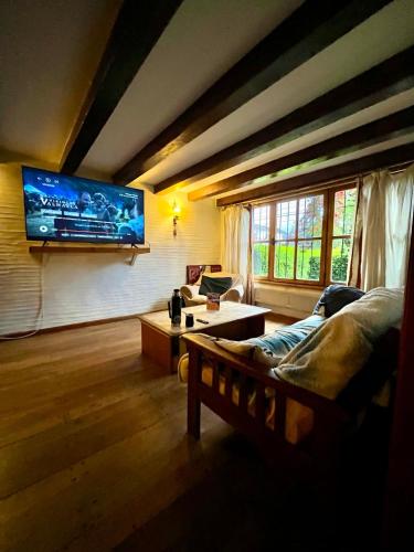 Közös társalgó / TV, Universal Traveller's Hostel in San Carlos Bariloche