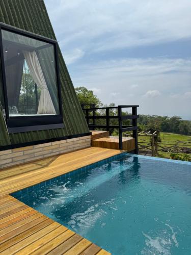 Swimming pool, Refugio do Miradouro chale 1 in Mampituba