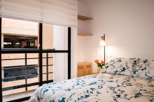 Apartamento Central-Silencioso con Parquedero y WiFi 900mbps