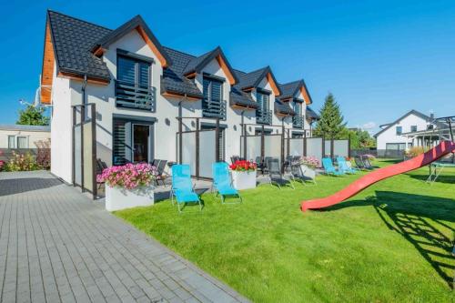 Domki Apartamentowe Aura - Grzybowo