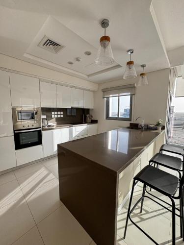 Beachside 2BR Retreat in Durrat Marina in Sakhir