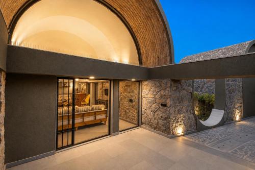 ELIVAAS Signature Stone Age Home Fernwood 6-BHK Stone-Clad Estate with Bamboo Cottages, Private Pool in Jaswantpura