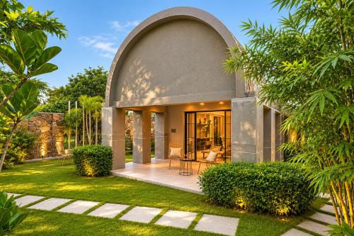 ELIVAAS Signature Stone Age Home Fernwood 6-BHK Stone-Clad Estate with Bamboo Cottages, Private Pool in Jaswantpura