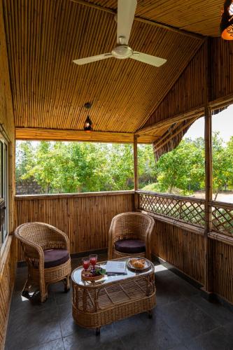 ELIVAAS Signature Stone Age Home Fernwood 6-BHK Stone-Clad Estate with Bamboo Cottages, Private Pool in Jaswantpura