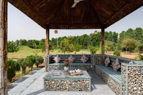ELIVAAS Signature Stone Age Home Fernwood 6-BHK Stone-Clad Estate with Bamboo Cottages, Private Pool in Jaswantpura