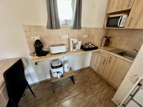 virtuve, Sára Apartman (Sara Apartman) in Buzsak
