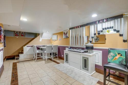 Near Parks & Metra Stations! Chicago Apt w/ Bar in Ashburn
