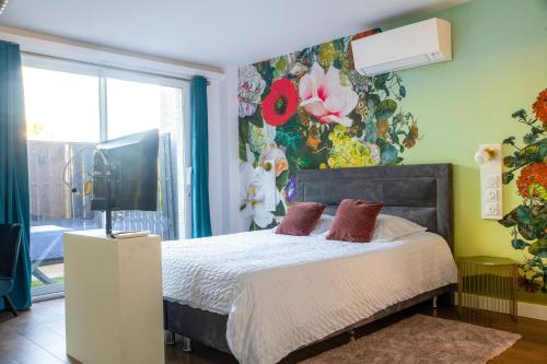 Gulta, Suite Touraco, clim, balneo, terrasse - Parc des Oiseaux in Villars-les-Dombes