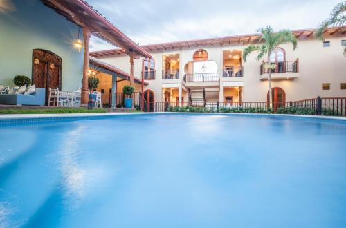 Swimming pool, Hotel Plaza Marbella Granada in Granada