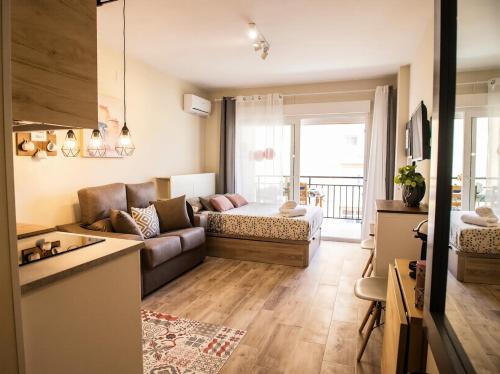Bella Aura Acogedor Estudio con Terraza en el Centro