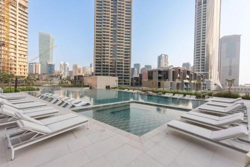 Free housekeeping visits during your stay - StayShort - Sleek Business Bay 1BR - Modern Stay for 4 - image 13