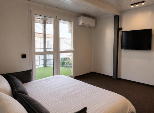 ห้องส่วนกลางสำหรับนั่งเล่น/ดูทีวี, Silveroks Sea Apartments in ชอร์โนมอร์สค์