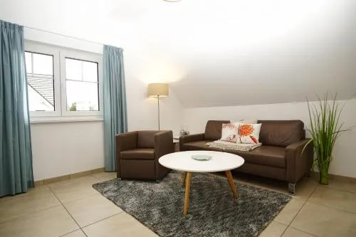 Strandresort Rex Rugia Ferienwohnung 11-8 mit Sauna- und Schwimmbadnutzung im AHOI Sellin in Lobbe, Deutschland