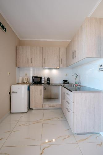 Køkken, ALLAGIANNIS GROUP APARTMENTS in Markópoulo
