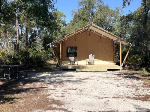 Luxurious Deluxe Safari Tent with King Bed and Outdoor Fire Pit in Bradenton, Florida