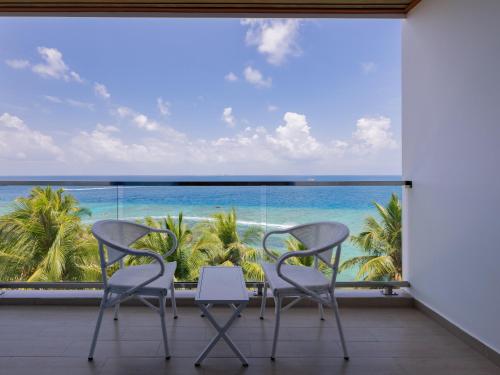 View, Kaani Palm Beach at Maafushi in Maldive Islands