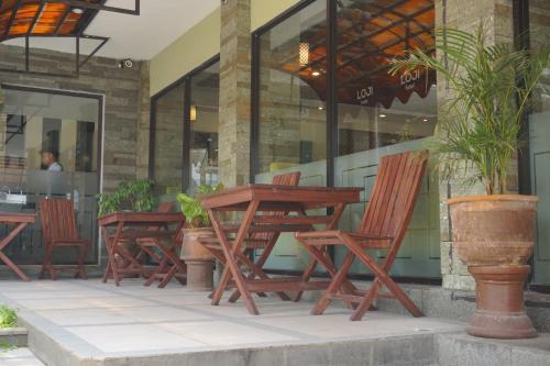 Loji Hotel near Toko Kue Wina