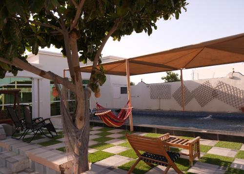 Garden, Sea Turtles Guest House in Ras Al Hadd