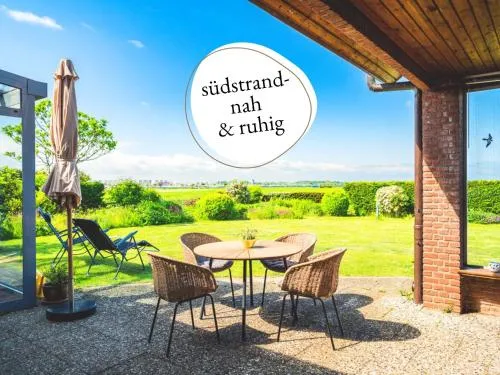 Huus Binnensee - Erdgeschoss-Wohnung mit Garten & Seeblick - Wintergarten & Terrasse - hundefreundlich - ruhige Lage - Südstrand 5 Min mit Rad in Fehmarn, Deutschland