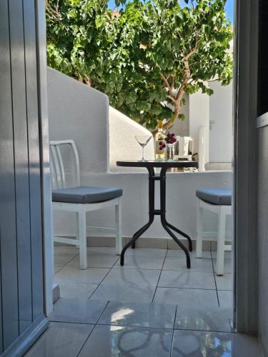 شرفة/ تراس, بورتو كاستيلو (Porto Castello) in Exo Gialos Thiras