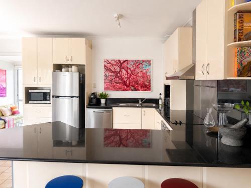 Kitchen, 4BR Coastal Home - Ocean Views, backs onto forest, beach access in Bundeena