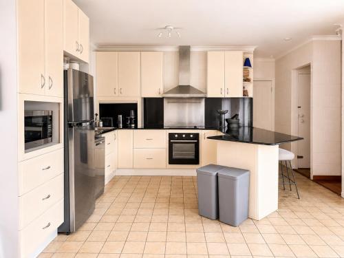 Kitchen, 4BR Coastal Home - Ocean Views, backs onto forest, beach access in Bundeena