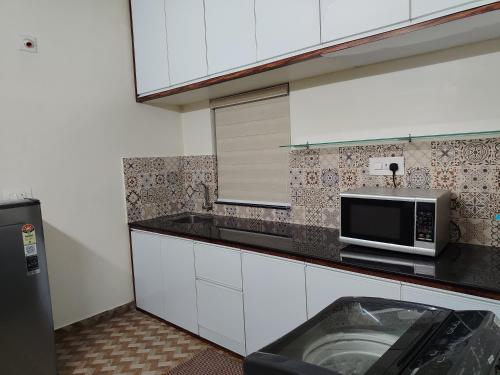 virtuve, Ocean wings Traditional beach villa in Moonnupeedika