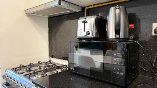 Stylish Studio Apartment at RMT Residence with Gym Pool and Free Parking - image 7