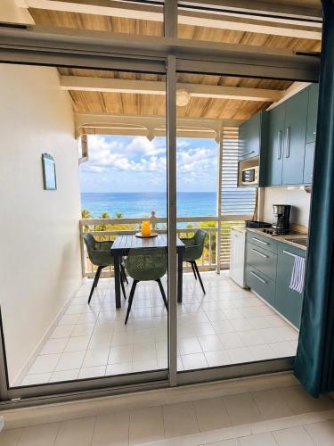 Studio vue mer, accès piscine (Studio vue mer, acces piscine) in เลอ ยามัน