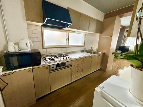 JKN Twin Building Homestay near Asahikawashi City Museum