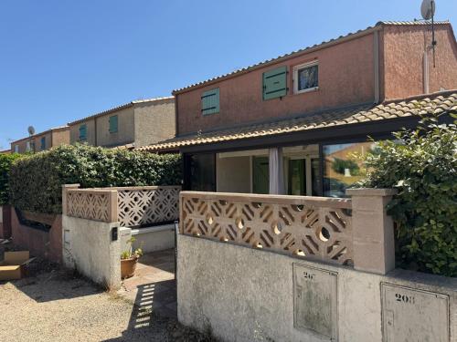 HOLIDAYLAND VILLA 207 RESIDENCE LES JARDINS D'ULYSSE CLIM 3 CHAMBRES 60 M2
