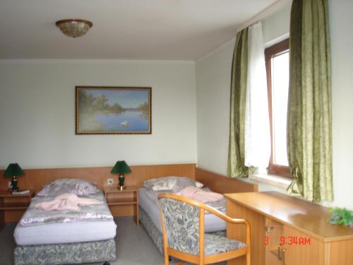 B&B Haldensleben - Pension zum Schwanenteich - Bed and Breakfast Haldensleben