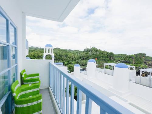 Balcony/terrace, Jungwok Blue Ocean Resort in Bedoyo