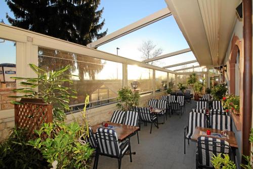 Εστιατόριο, Hotel-Restaurant Axion in Βέιλ Αμ Ράιν