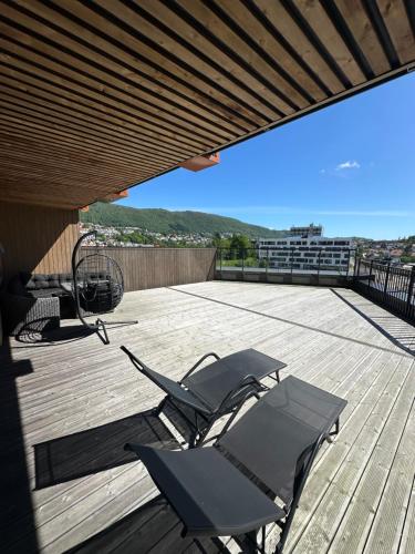 Apartment close to city center with 65 m2 balcony
