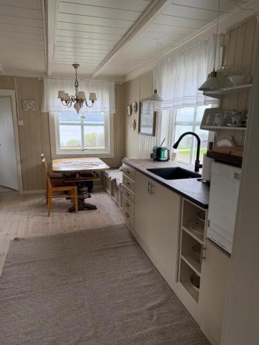 Det gamle huset i Oksfjordhamn in Durmalsskardet