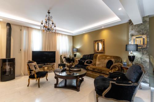 Shared lounge/TV area, Mythodea Luxury Villa Ι Sunset Horizon & Jacuzzi in Agkidia
