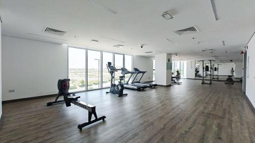 Free housekeeping visits during your stay - StayShort - The Serene Suite - Premium 1BR Dubai South Urban Escape - image 9