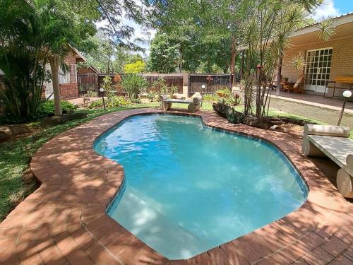 Piscina, Hunters Rest Guest House in Hoedspruit