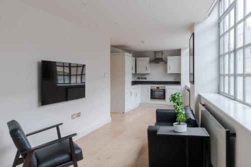Farringdon 1-Bed Apartment - Lift - Sleeps 3, Londyn