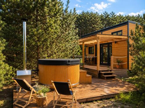 Oaza Święty Spokój - Tiny House z Balią i Jacuzzi przy rzece Narew (Oaza Swiety Spokoj - Tiny House z Balia i Jacuzzi przy rzece Narew) in Szelkow
