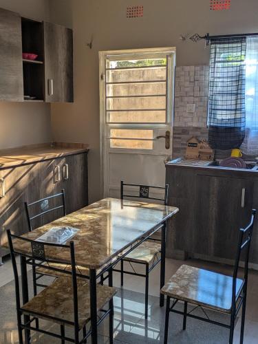 Maneya Apartments in Ntowololo