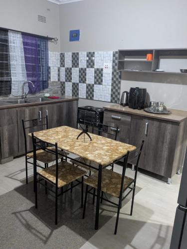 Maneya Apartments in Ntowololo