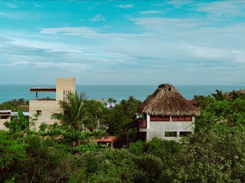 ระเบียง/ชานเรือน, Punta Kai Hotel & Hostal in เปอร์โต เอสคอนดิโด้