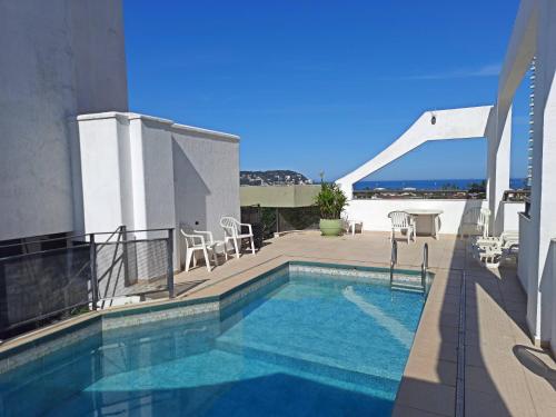 Swimming pool, Canto do Atlantico Hotel in Guaruja
