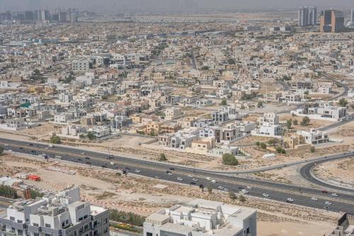 Free housekeeping visits during your stay - StayShort - 1BR in Jumeirah Village Circle for 4 with Balcony - image 9