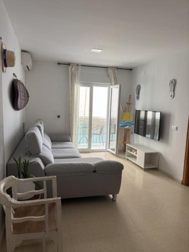 Apartment in downtown Conil with covered parking