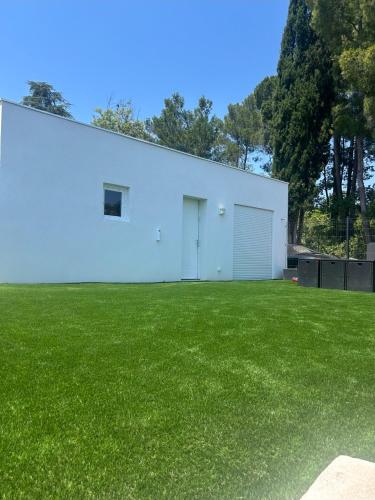 Petit Havre de Paix, Maisonnette contemporaine climatisée avec jardin privé