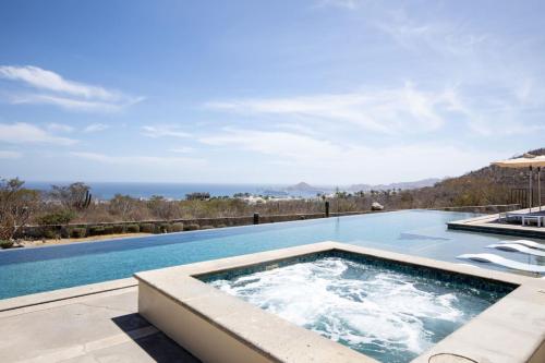 Condo con vista al arco, piscina infinity y spa