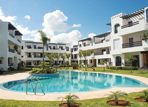 MOU - Appartement moderne 2 chambres avec piscine a Skhirat Plage in Skhirat